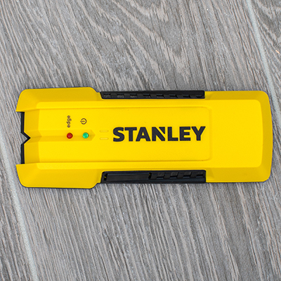 STANLEY<sup>&reg;</sup> Stud Sensor -  Detect the location of wood or metal studs up to 3/4-inch beneath surface material with this easy-to-use stud sensor. Featuring a sturdy design, this sensor will indicate with sequential LEDs, marking both the edges and center of studs with accuracy up to 1/8" for wood and 1/4" for metal.